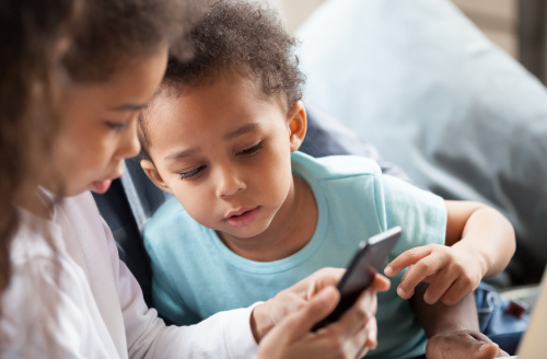 Two young people on a mobile phone